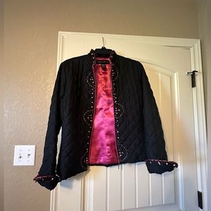 Silkland jacket made from 100% silk detailing along the outer edge. Lightweight